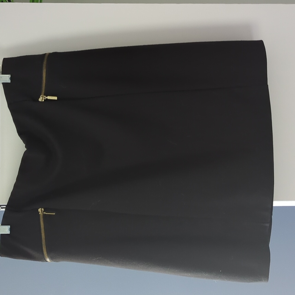 George black mini skirt with zipper accent, no real pockets